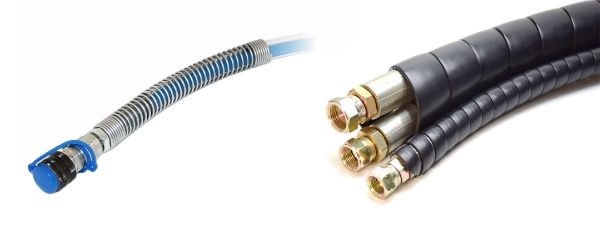 Several hydraulic hoses are protected with plastic and metal spiral guard.