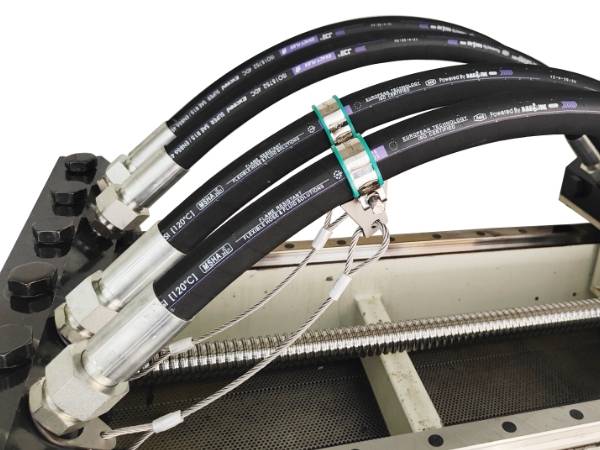 Hose whip restraining system is installed on the hoses.