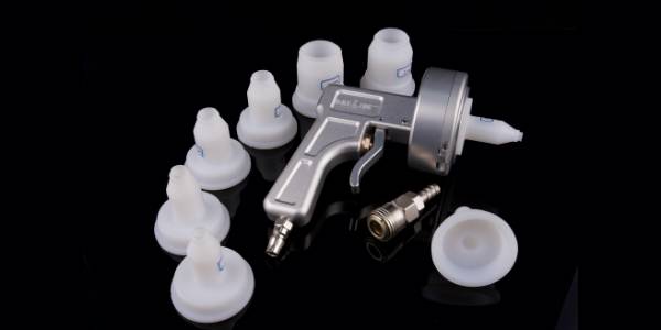 Different types of hose fittings and a hydraulic hose cleaning gun.